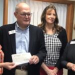 FUMS presenting grant check